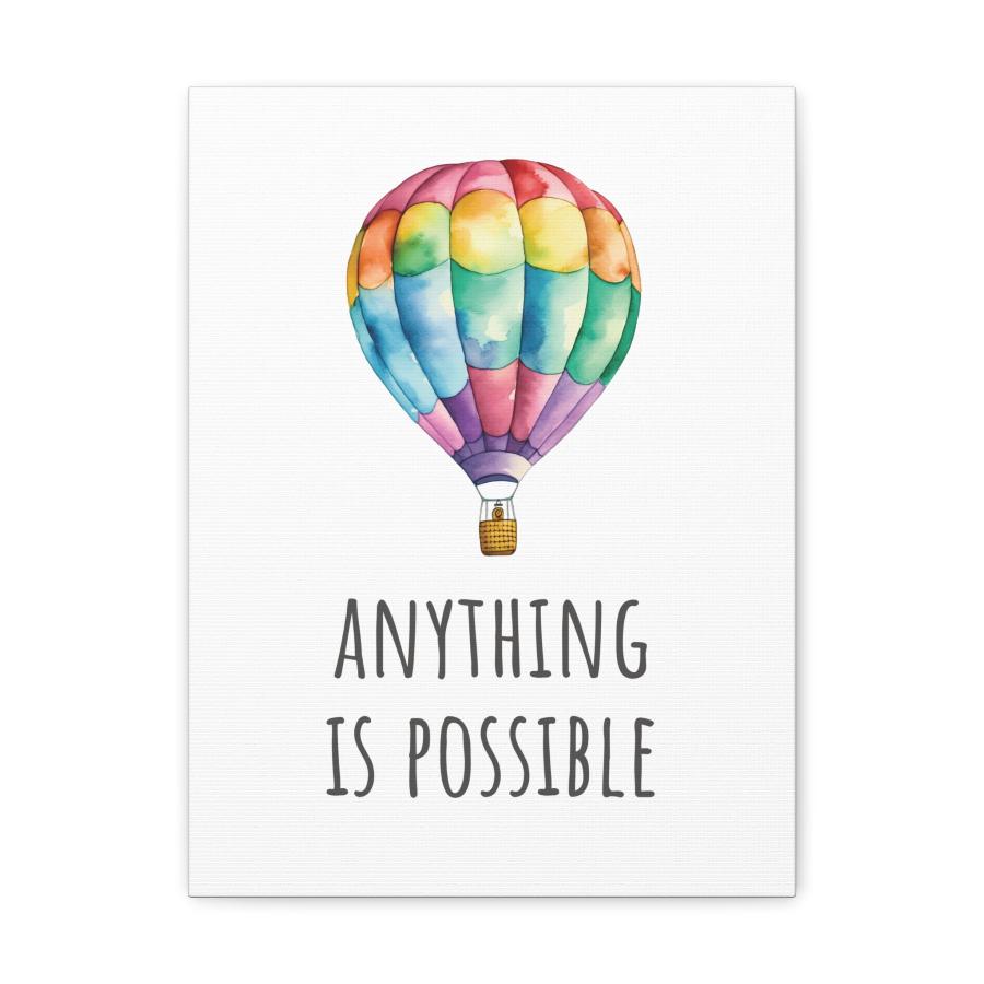 Front view of a  canvas print featuring a colorful watercolor hot air balloon with the inspirational text 'Anything is Possible' beneath it.