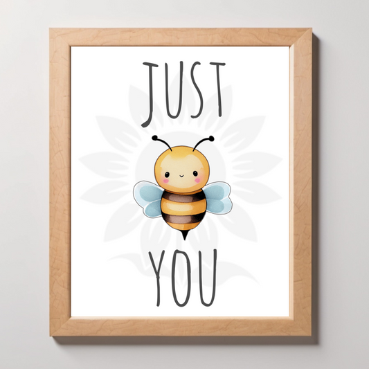 Mockup wall art from Blossoming Minds featuring a cute, smiling bee with the message 'JUST BE YOU,' encouraging self-acceptance and empowerment for children. This design aligns with Blossoming Minds' mission to inspire limitless beliefs and self-worth in young minds