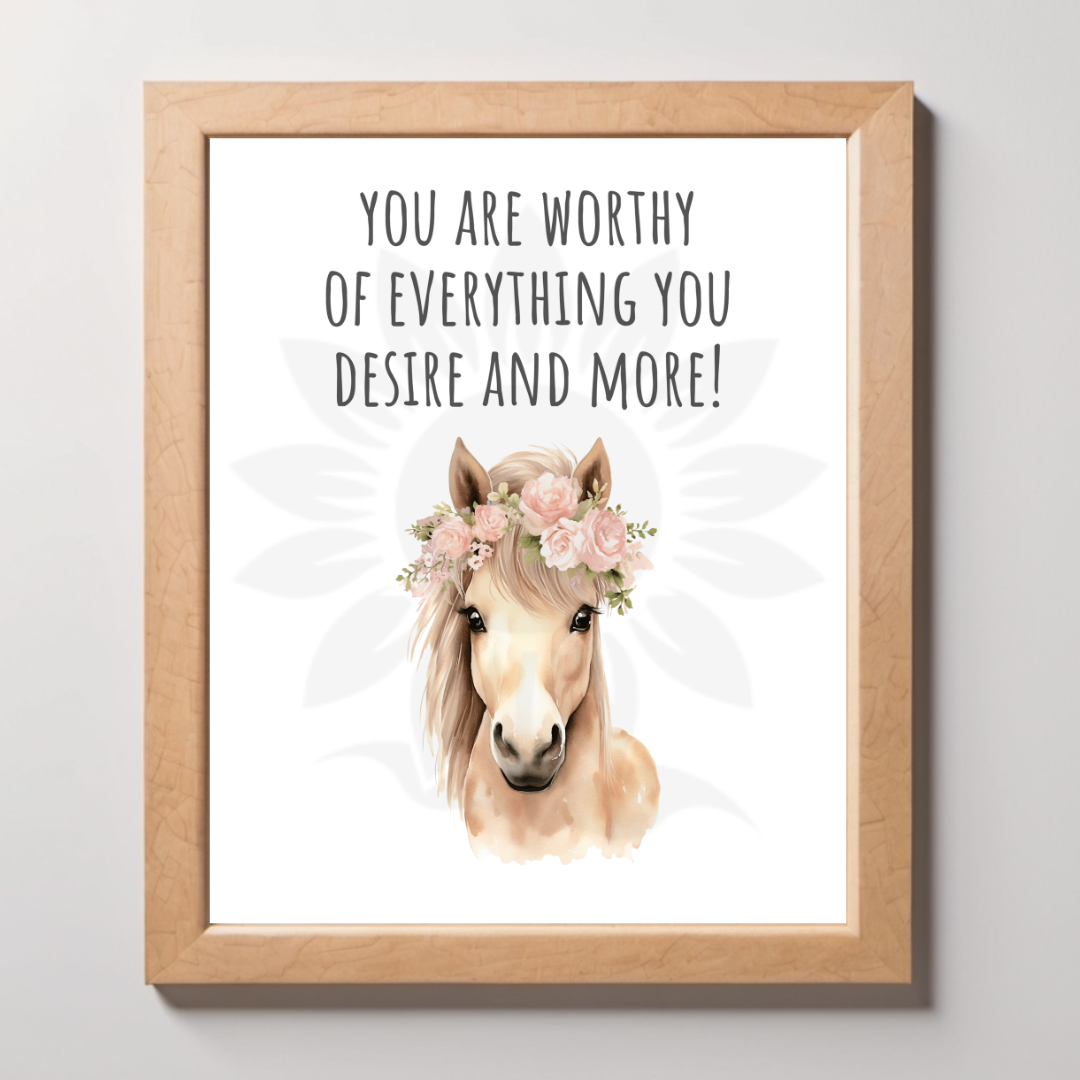 Mockup wall art featuring a charming horse with a floral crown and the text 'YOU ARE WORTHY OF EVERYTHING YOU DESIRE AND MORE!' The design is from Blossoming Minds, promoting self-worth and positivity for children.